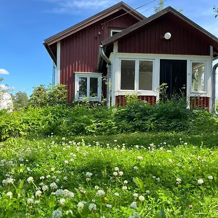 Chalet Peltosaaren Luomulammastila *